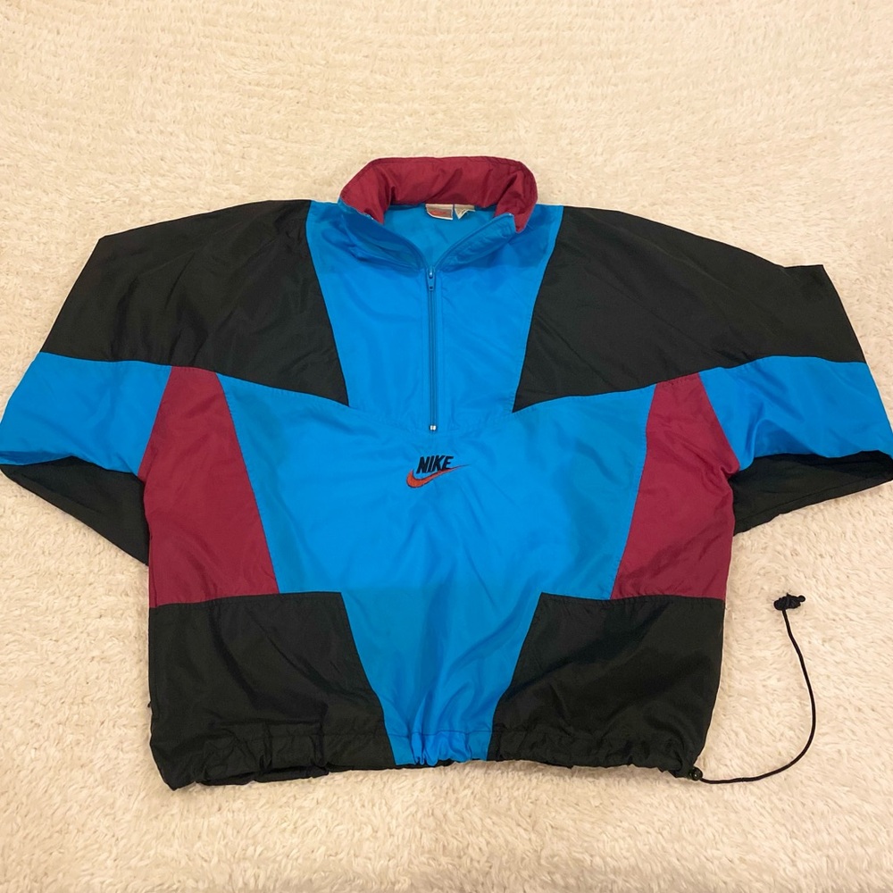 Men’s large vintage Nike center swoosh windbreaker